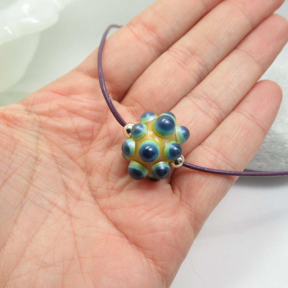 Glass bead on leather necklace